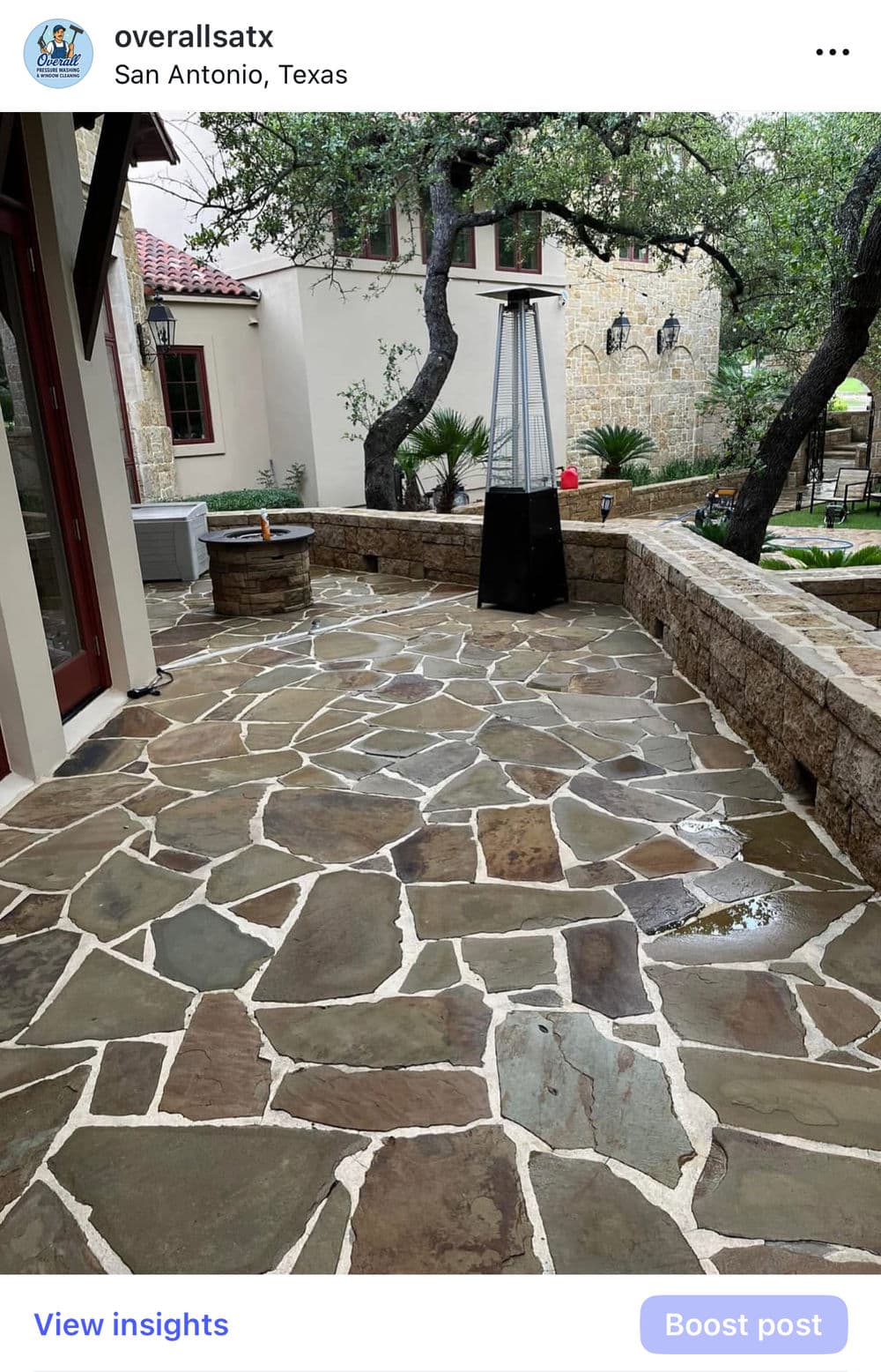 Flagstone patio with a heater in a San Antonio, Texas outdoor living space.